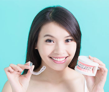 invisalign aligners and conventional braces for adults